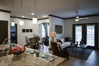 2BR, 2BA - 1,253 SF - Falcon - Living, Dining - 9910 Sawyer Apartamentos in Louisville, Kentucky