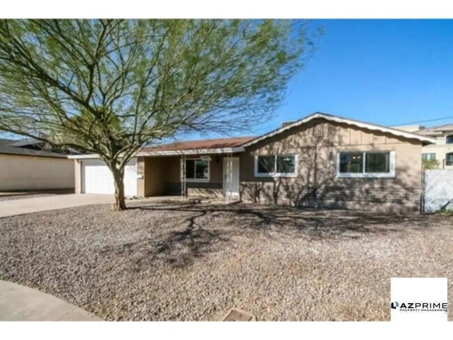 property at 7421 E Belleview St