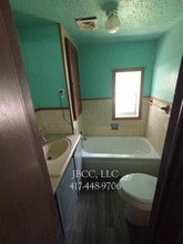 629 N Olive St in Nevada, MO - Building Photo - Building Photo