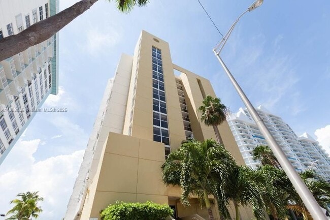 property at 5880 Collins Ave
