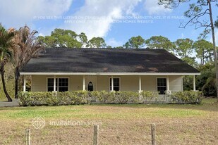 15553 67th Ct N in The Acreage, FL - Building Photo
