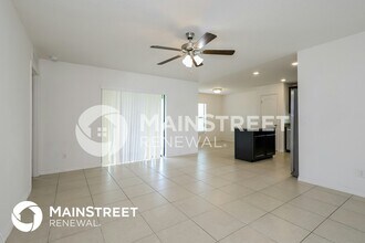 1499 Swan Lake Cir in Dundee, FL - Foto de edificio - Building Photo