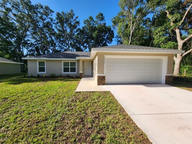 property at 5617 NW 65th Pl
