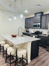 6153 N Ceylon St, Unit 2302 in Denver, CO - Foto de edificio - Building Photo