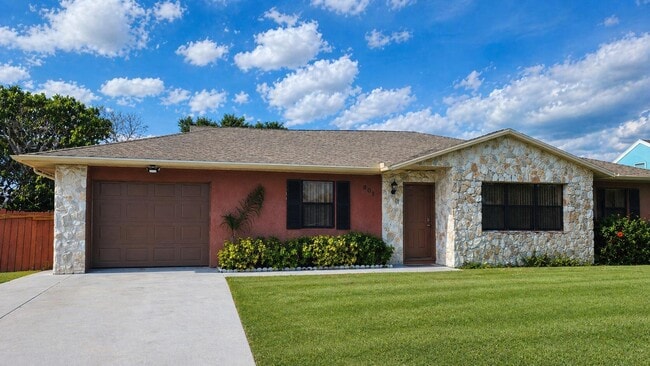 property at 805 SE Cavern Ave