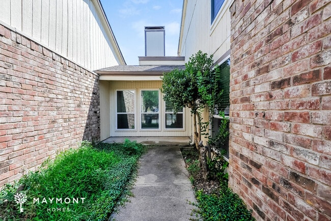 property at 8707 N Normandale St