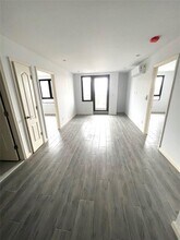 7302 Woodside Ave in Queens, NY - Building Photo - Building Photo
