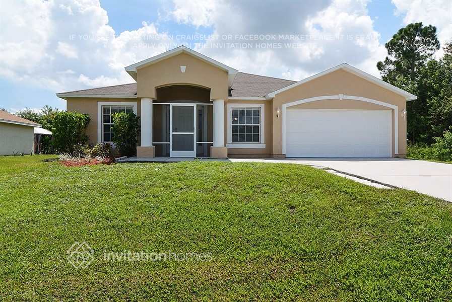 2561 SW Calender St in Port St. Lucie, FL - Building Photo