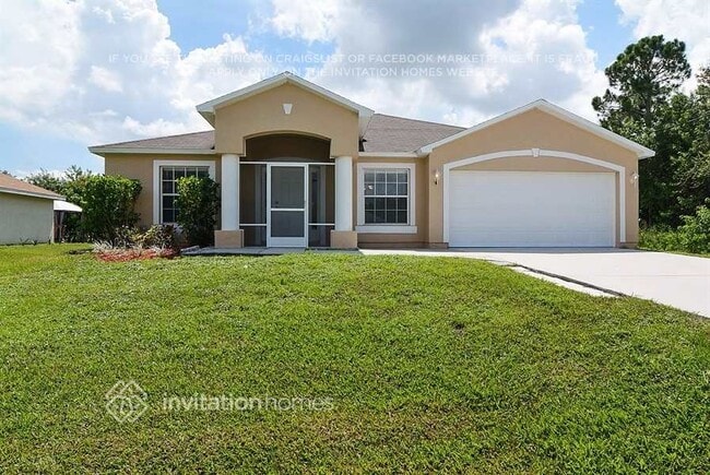property at 2561 SW Calender St