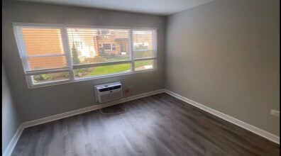 1321 W Sherwin Ave, Unit 1B in Chicago, IL - Building Photo - Building Photo