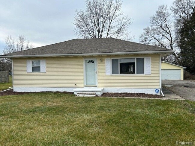 property at 6106 S Dort Hwy