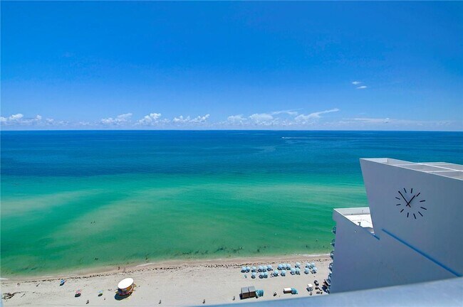 property at 6899 Collins Ave