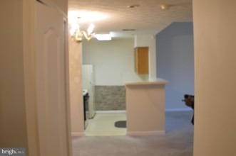 8911 Town Center Cir-Unit -4-303 in Upper Marlboro, MD - Building Photo - Building Photo
