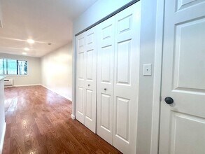 4975 Washington St, Unit 109 in Boston, MA - Building Photo - Building Photo