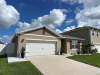 1987 Cacutta Wy in Kissimmee, FL - Foto de edificio - Building Photo