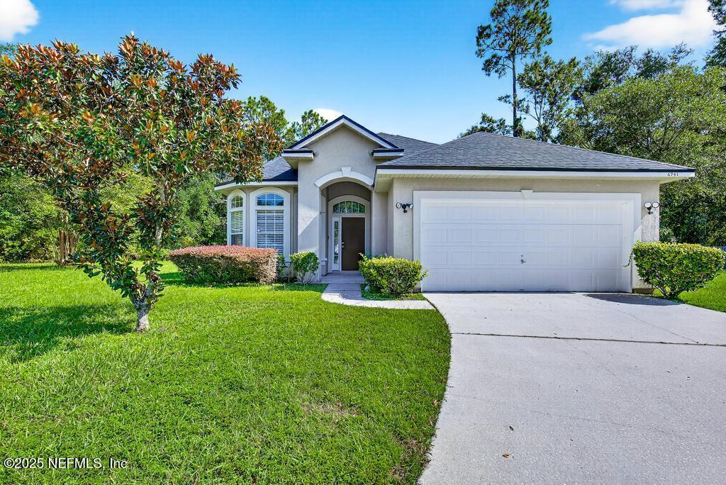 6941 Morse Oaks Dr in Jacksonville, FL - Building Photo