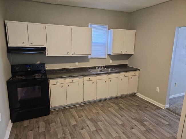 property at 320 E 9th St