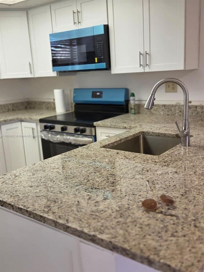 property at 10823 NW 7th St