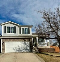 10880 Longs Peak Ln in Parker, CO - Building Photo