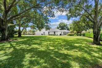 15575 Woodmar Ct in Wellington, FL - Building Photo - Building Photo