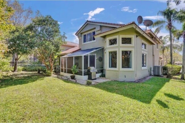 12591 NW 57th Pl in Coral Springs, FL - Building Photo - Building Photo