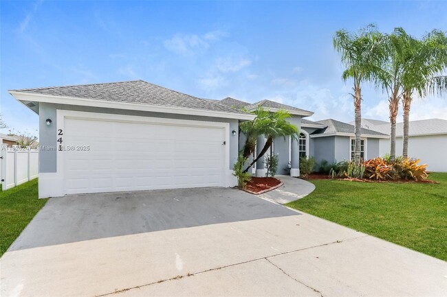 241 SW S Quick Cir in Port St. Lucie, FL - Building Photo - Building Photo
