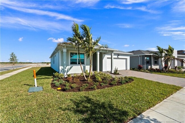property at 14143 SW Safi Ter