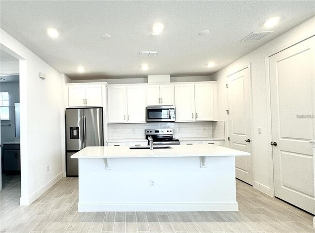 10581 Marconi Ave in Orlando, FL - Building Photo - Building Photo