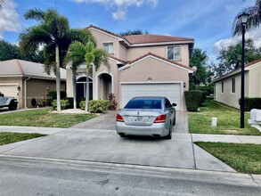 3803 Woodfield Dr in Coconut Creek, FL - Building Photo - Building Photo