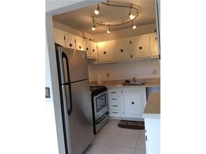 500 Village Green Cir W in Palm Springs, FL - Building Photo - Building Photo