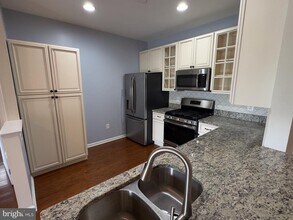 6553 Grange Ln-Unit -203 in Alexandria, VA - Building Photo - Building Photo
