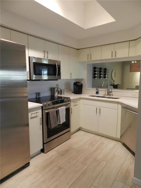 3020 Alcazar Pl-Unit -306 in Palm Beach Gardens, FL - Building Photo