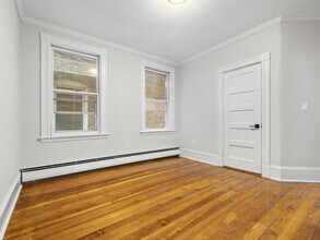 131 Cottage St, Unit 1 in Boston, MA - Foto de edificio - Building Photo