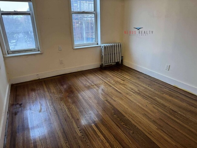 property at 43-22 58th St