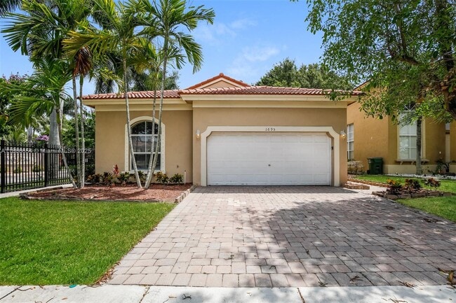 property at 1695 NE 37th Pl