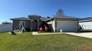 2129 Hibiscus Pl in Poinciana, FL - Building Photo - Building Photo