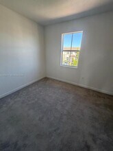 12148 NW 24th Pl in Miami, FL - Building Photo - Building Photo