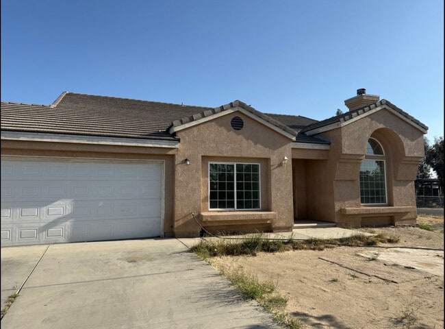 property at 10708 E Avenue R4
