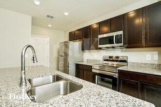 4073 SW Jaqust St in Port St. Lucie, FL - Building Photo - Building Photo