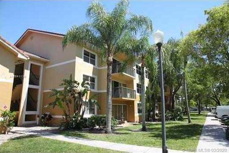 8977 Wiles Rd-Unit -308 in Coral Springs, FL - Building Photo