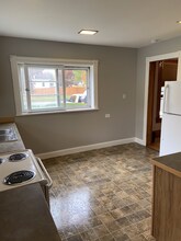 206 S Higbee St, Unit Lower in Reed City, MI - Foto de edificio - Building Photo