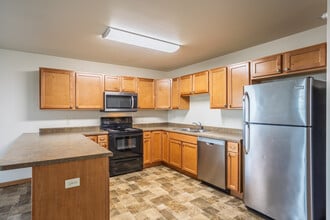 The Pines Luxury Security Apartments in Minot, ND - Building Photo - Interior Photo