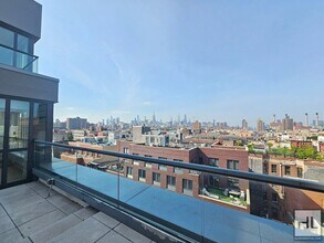 Modern 1-Bedroom with Private Balcony | Ea in New York, NY - Building Photo - Building Photo