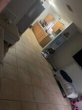 213 10th St NW, Unit 213-A in Moore Haven, FL - Foto de edificio - Building Photo