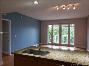 3540 Main Hwy-Unit -404 in Miami, FL - Building Photo - Building Photo