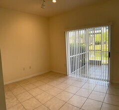 7603 Plantation Cir in University Park, FL - Foto de edificio - Building Photo