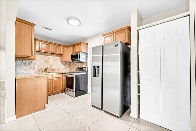 property at 15710 NW 19th Ave