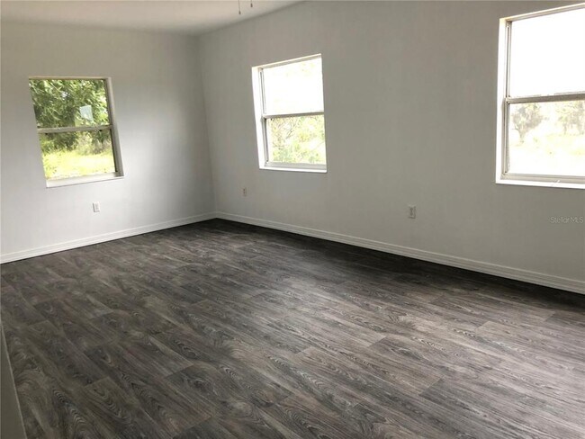 12838 Florida Ave in Astatula, FL - Building Photo - Building Photo