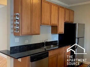 1619 W Wallen Ave, Unit W1 in Chicago, IL - Building Photo - Building Photo