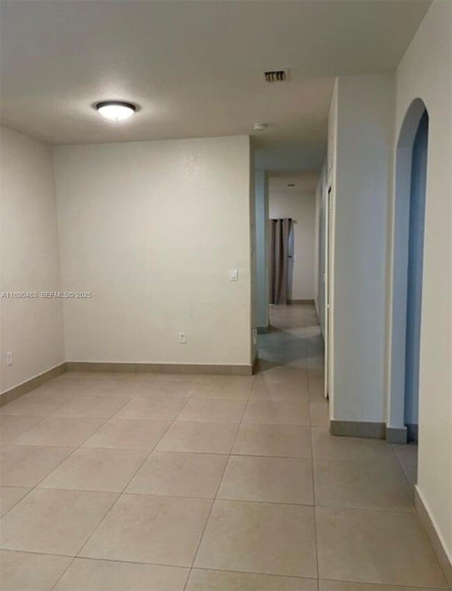 1661 SE 29th Ct, Unit 103 in Homestead, FL - Foto de edificio - Building Photo